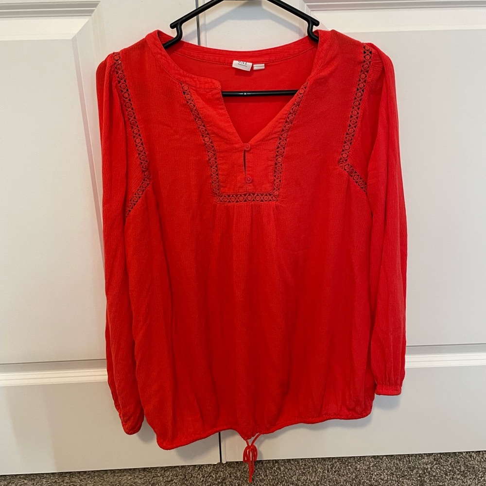 Red maternity shirt, size small